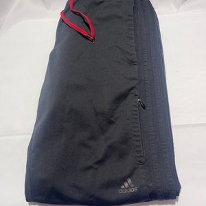 Adidas track pants medium black with red trim
